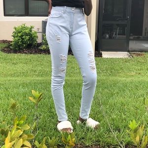 Light blue distressed jeans